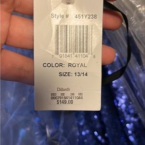 blue prom dress. brand new still has tags on it. size 13/14